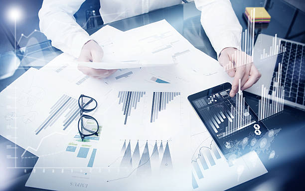 istock Sales Management Time Process.Photo trader work market report documents 533582468