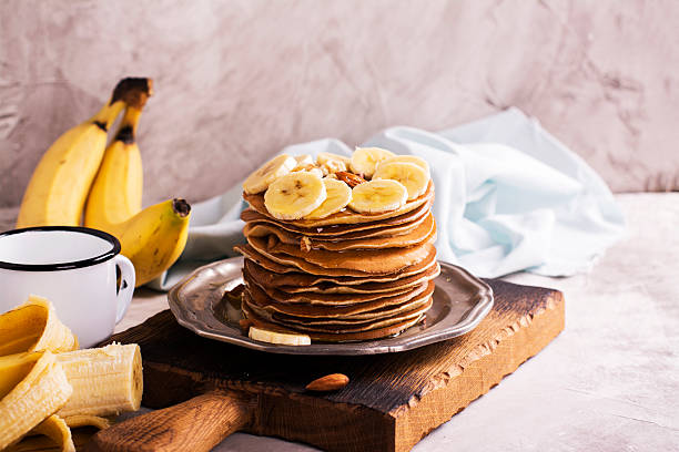 Stack of pancakes with ingredients stock photo