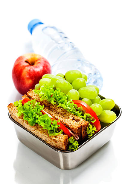 istock Lunch box with sandwiches and fruits 533607201