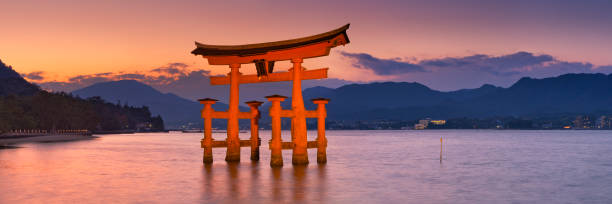 Miyajima, Japan - November 14, 2014: The torii gate of the Itsukushima Shrine on Miyajima Island near Hiroshima. A gate has been in place since 1168, the current gate dates back to 1875.