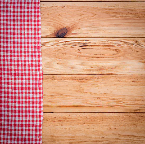 istock Wooden table with tablecloth tartan top view 533608603