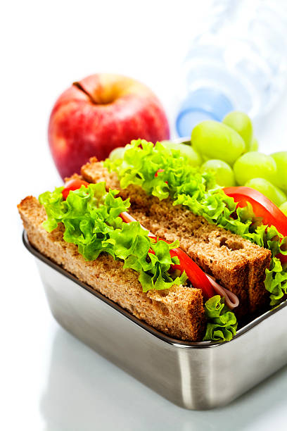 istock Lunch box with sandwiches and fruits 533608809