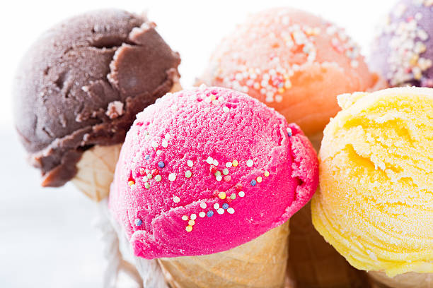 istock Ice cream scoops on wooden table. 533609357
