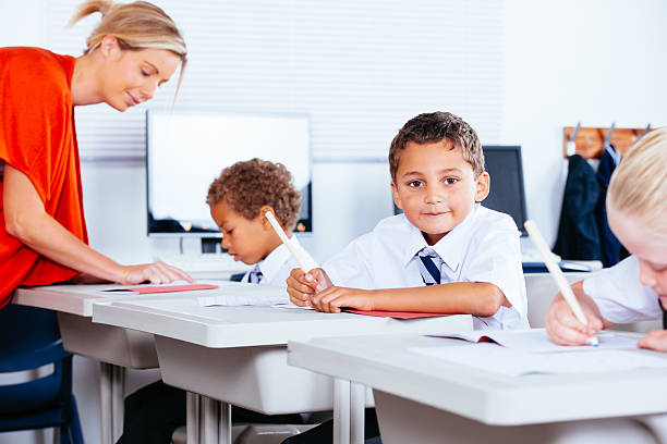 istock Row Of Primary School Children In A Classroom 533610153
