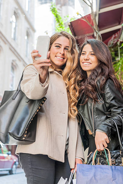 istock Pretty Women Taking Selfie Mobile Device, Beyoglu, Istanbul, Turkey 533610357