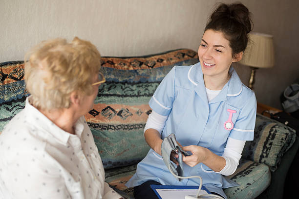 istock home visit blood pressure health check 533610715