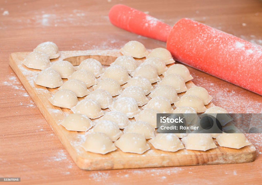 Homemade raw pastry dumplings with meat filling called pelmeni 2015 Stock Photo