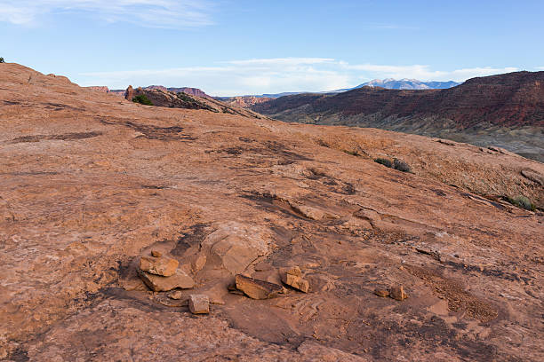 istock Climbing to Delicate Arch with La Sal Mountains in background 533611775