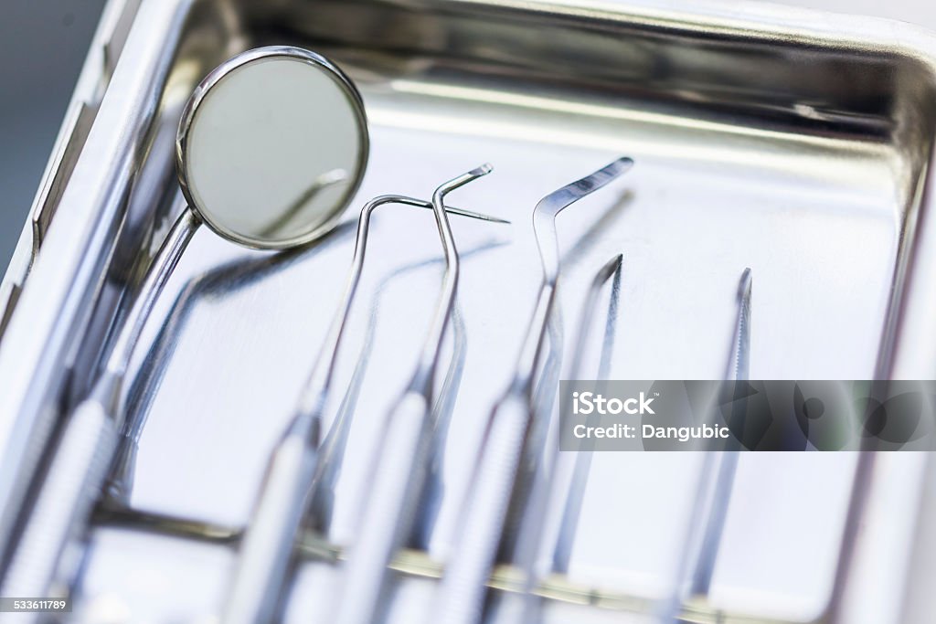 Set Of Metal Dentist's Medical Equipment Close Up Of Set Of Metal Dentist's Medical Equipment Tools In Dental Clinic 2015 Stock Photo