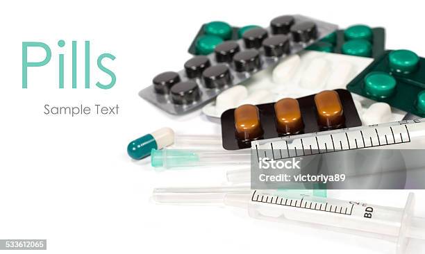 Pills And Syringes Isolated Stock Photo - Download Image Now - 2015, Addiction, Antibiotic