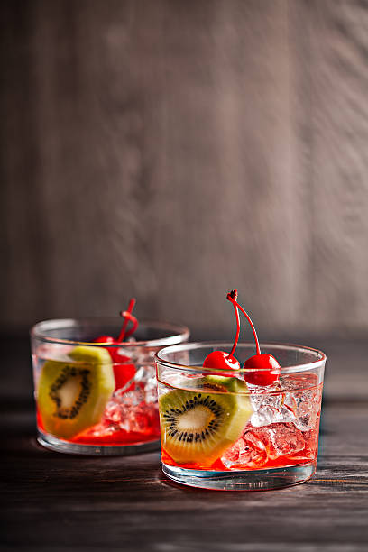 istock Cold summer cocktail drink with cherry and kiwi 533614669