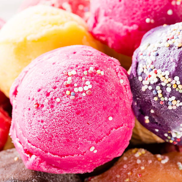 istock Ice cream scoops on wooden table. 533625383