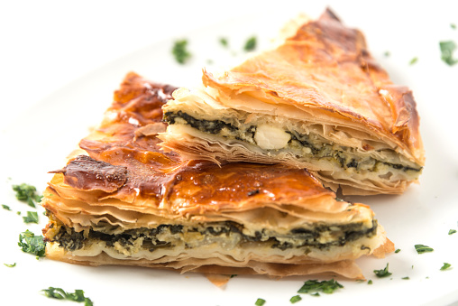 Spanakopita is a Greek pastry filled with spinach and cheese