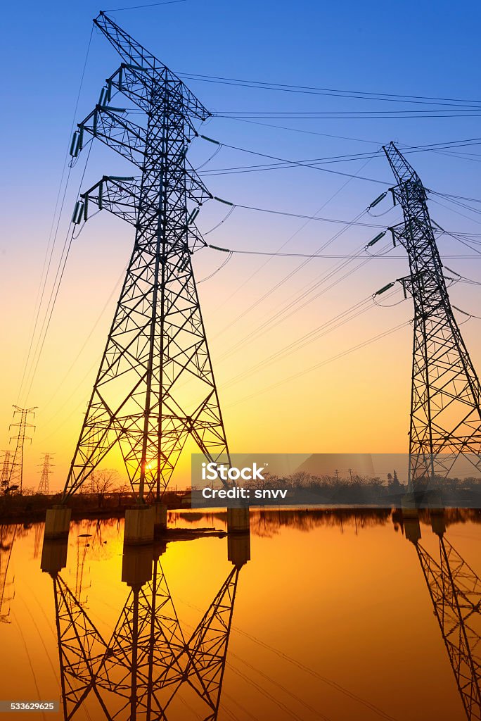 high voltage post.High-voltage tower sky background. 2015 Stock Photo