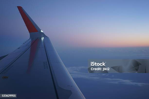 Sea Of Clouds From An Airplane Stock Photo - Download Image Now - 2015, Aircraft Wing, Airplane