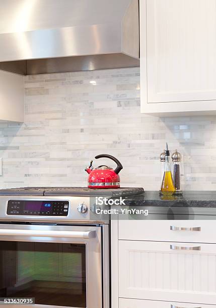 Contemporary Kitchen Design With Gas Range Stove And Hood Stock Photo - Download Image Now