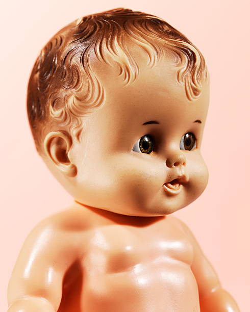 Plastic Baby Doll stock photo