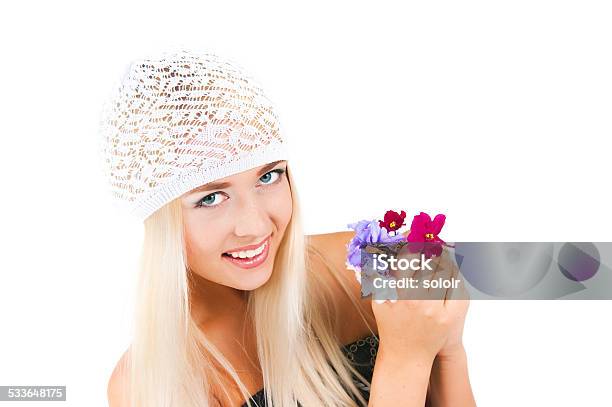 Blond Girl With A Bouquet Of Violets Stock Photo - Download Image Now - 18-19 Years, 20-24 Years, 2015