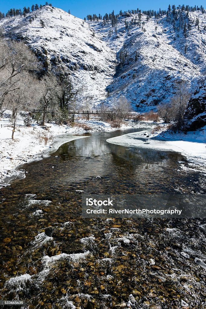 Colorado's Louder River in winter The beautiful Poudre River that runs through the Poudre Canyon outside of Fort Collins, Colorado in winter. 2015 Stock Photo