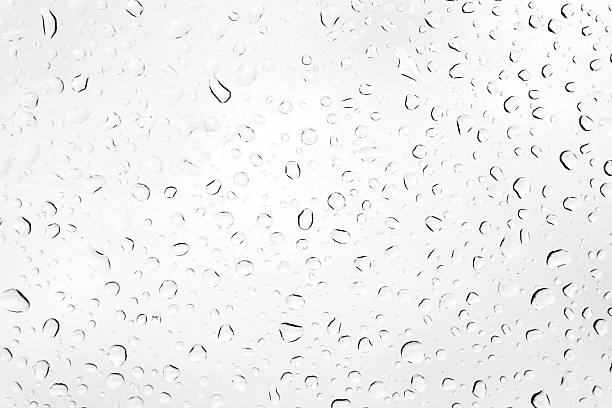 istock Drops of rain on glass window 533666447