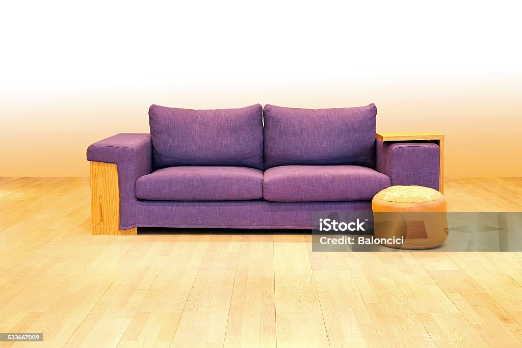 Sofa Purple textile sofa ant stool in empty room. 2015 Stock Photo