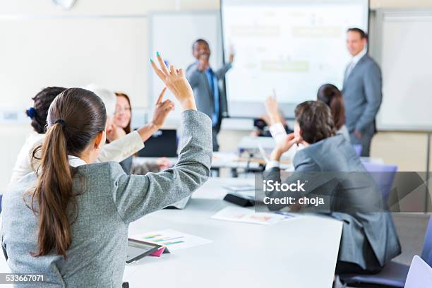 Business Meetingblack Lecturer Using Digital Projector Stock Photo - Download Image Now