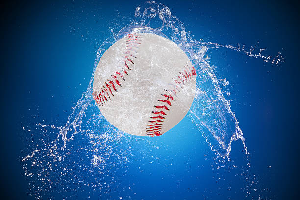 istock Water splash with sport ball 533667979