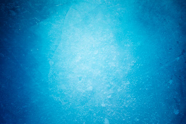 istock Textured ice blue frozen rink winter background 533669115