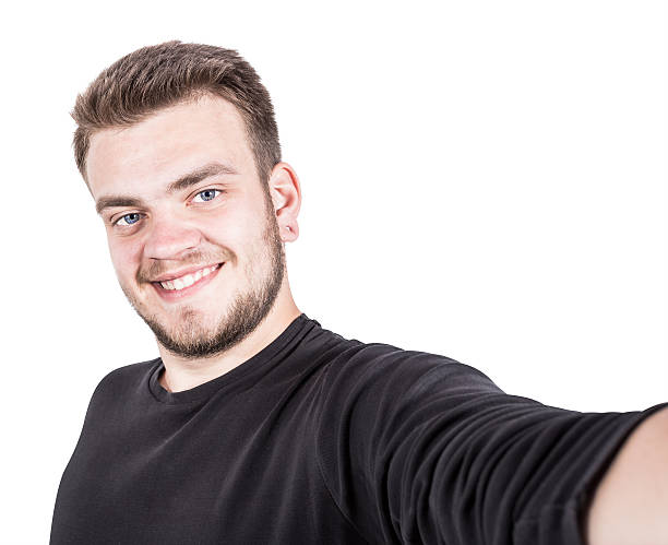 istock Happy  man taking a selfie photo. Isolated on white background 533669513