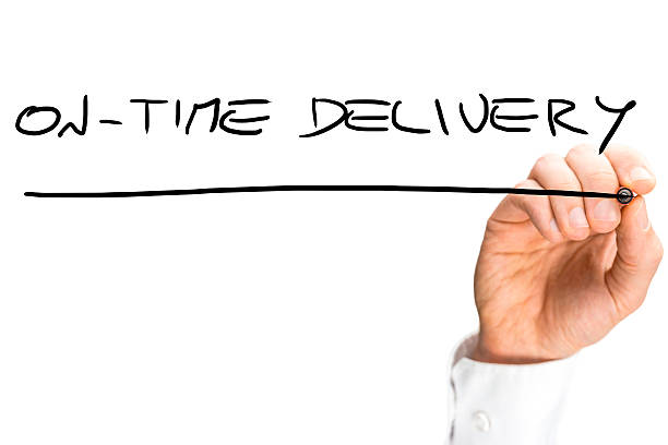 istock Man writing a handwritten message On time delivery 533693337