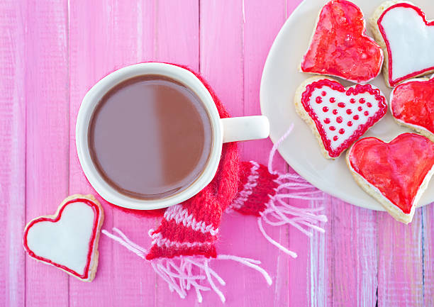sweet cookies and cocoa drink on a table
