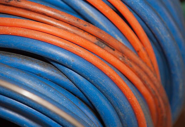 istock Old cable reel in Blue and orange 533694795