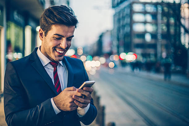 istock Businessman texting outdoors in the evening 533699194