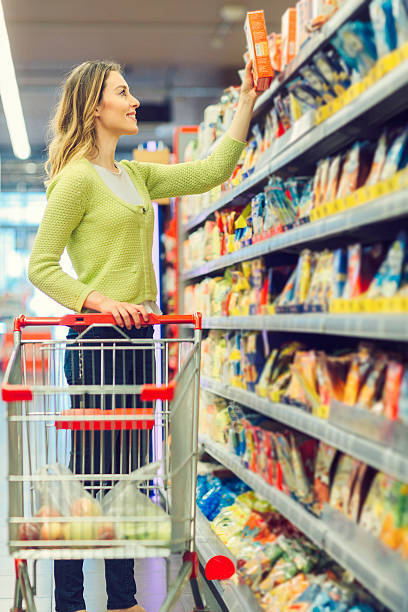 istock Young Woman Shopping Cereals. 533700162