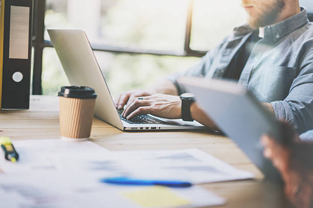 istock Photo Sales Manager Working Modern Office.Bearded Man Use Generic 533700980