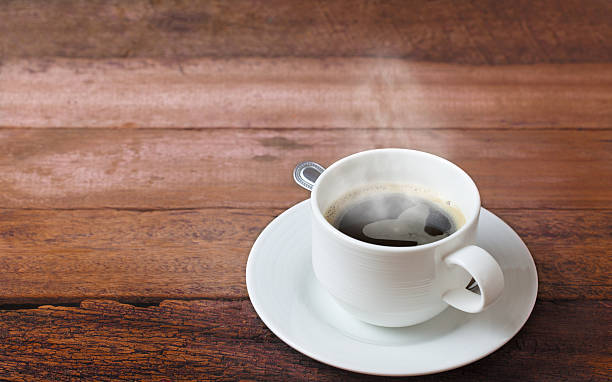 istock Coffee cup on a wooden table. 533702186