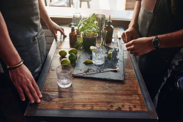 istock Barmen preparing new cocktail recipe 533704770