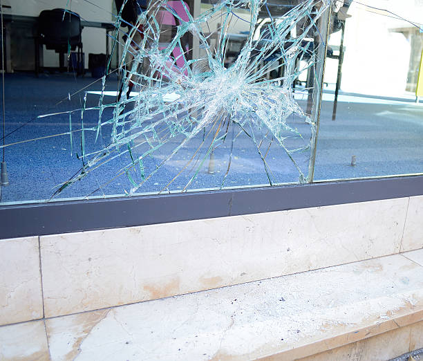 istock broken glass of an office 533710704