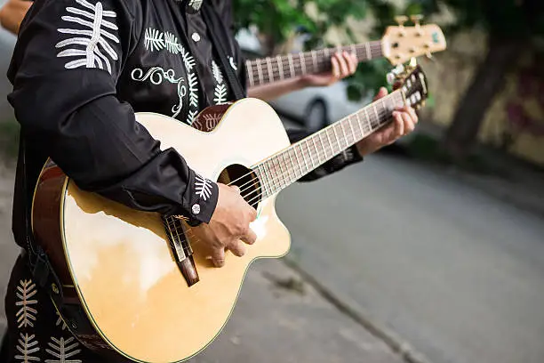 Photo of musician playing guitar