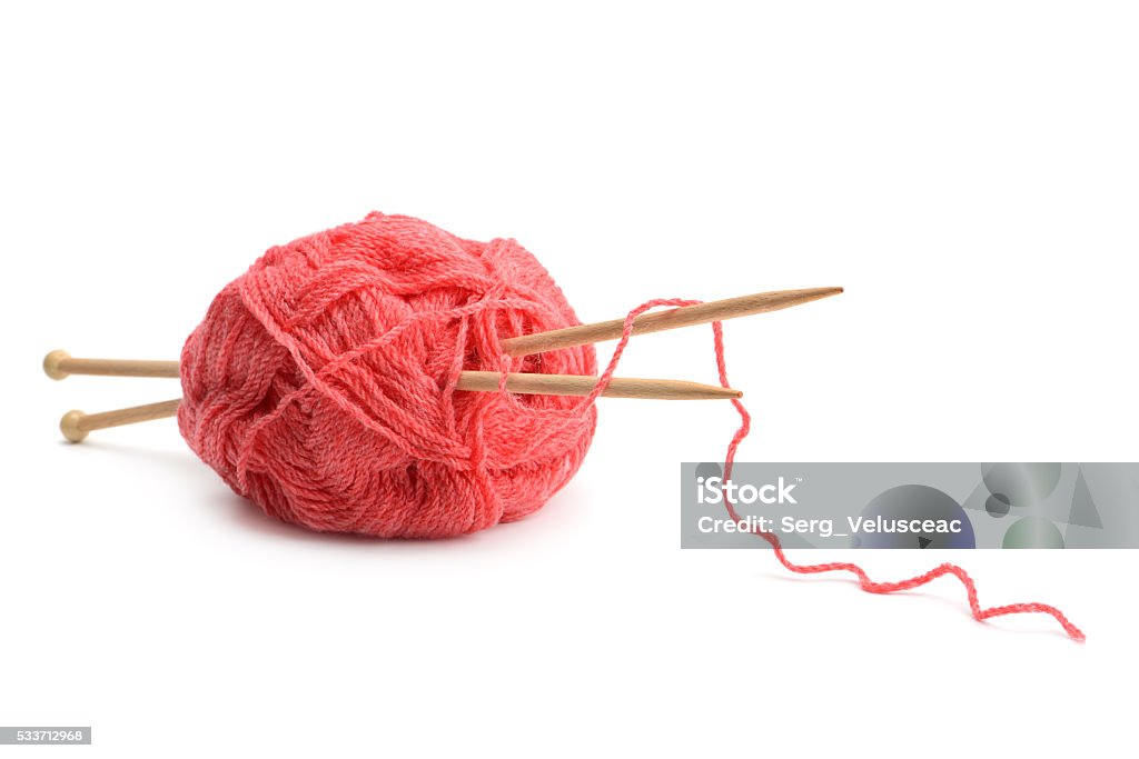 Woolen balls and knitting needles Woolen balls and knitting needles isolated on white Art And Craft Stock Photo