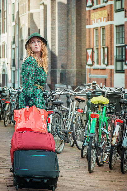 istock Tourist with suitcases in Amsterdam 533713328
