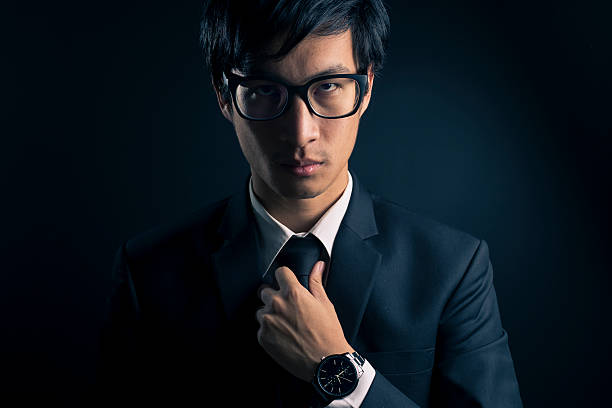 istock Businessman Adjust Necktie his Suit 533713526