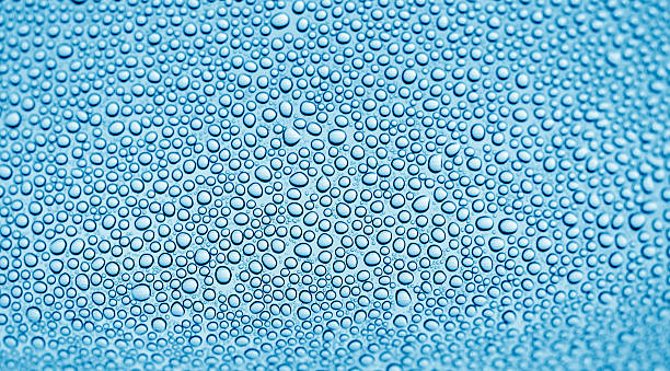 istock water drops on blue glass 533713730