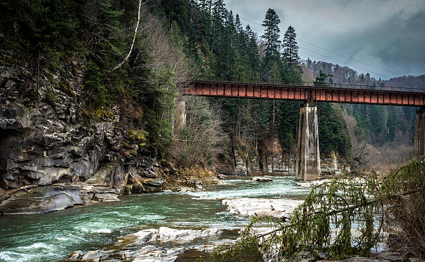 istock landscape in Carpathian mountains with river and railway bridge 533715280