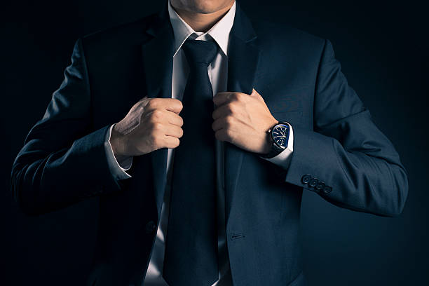 istock Businessman Dressing Up a Black Suit 533716164