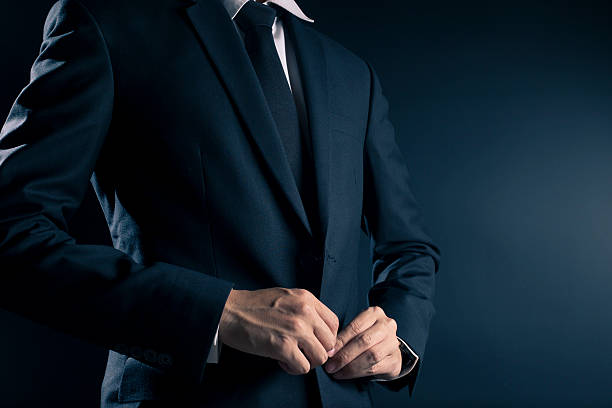 istock Businessman Dressing Up a Black Suit 533716362