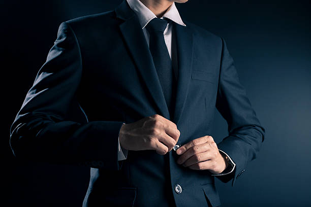 istock Businessman Dressing Up a Black Suit 533716486