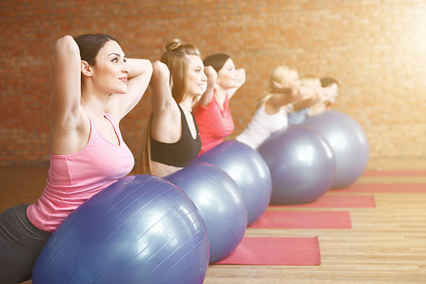 istock Cute fit women are training with equipment 533716778