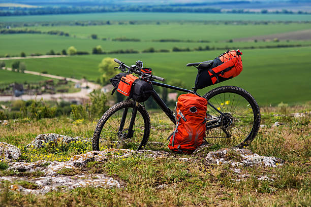 istock Bicycle with orange bags for travel 533717008