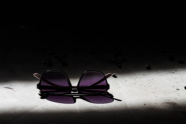 Elegant sunglasses in dark